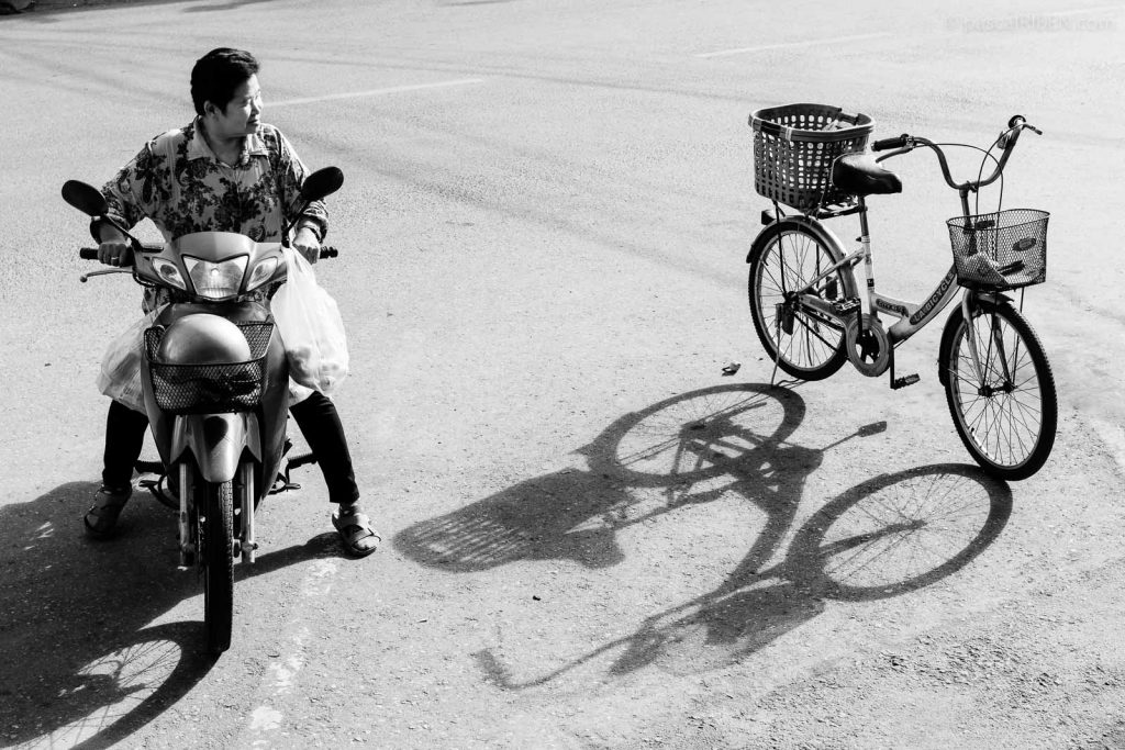 Bicycle and Moped in Nakhon Pathom, Thailand, July 23, 2017