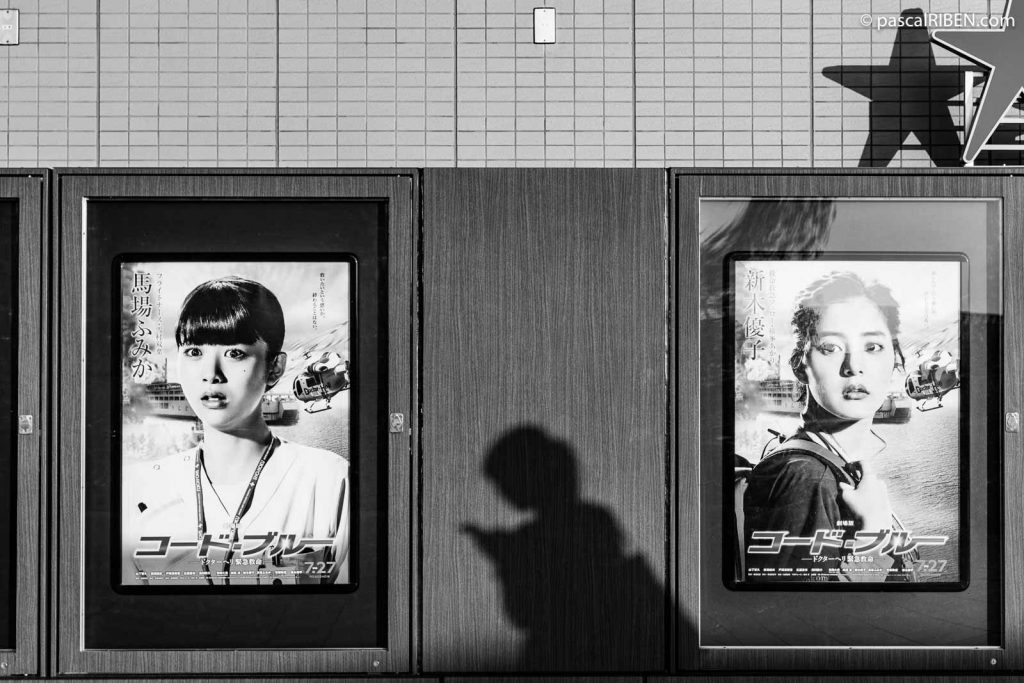Posters and shadow for the cinema located at the end of Kaze-no-hiroba Plaza, at Osaka Station City.