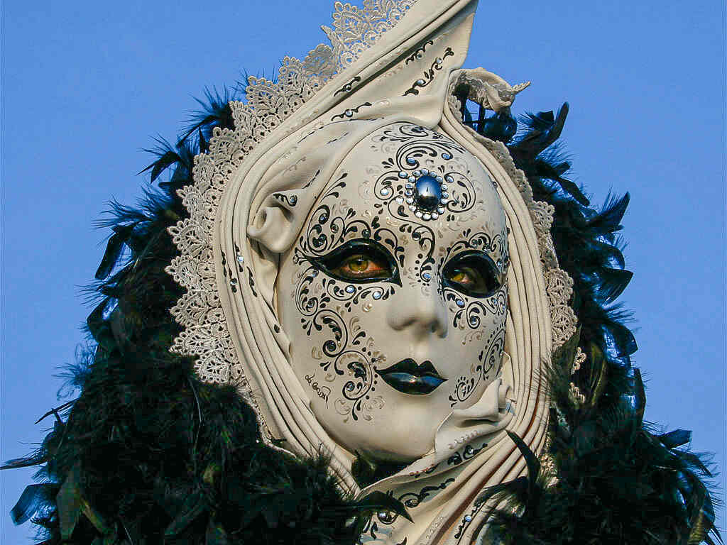 Portrait with white mask in Carnival of Venice